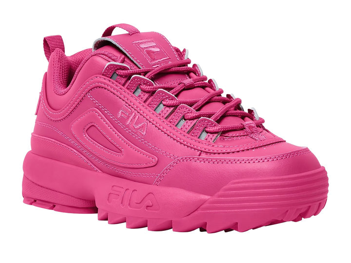 Tenis FILA Disruptor II Premium en color rosa intenso con suela robusta y dentada.
