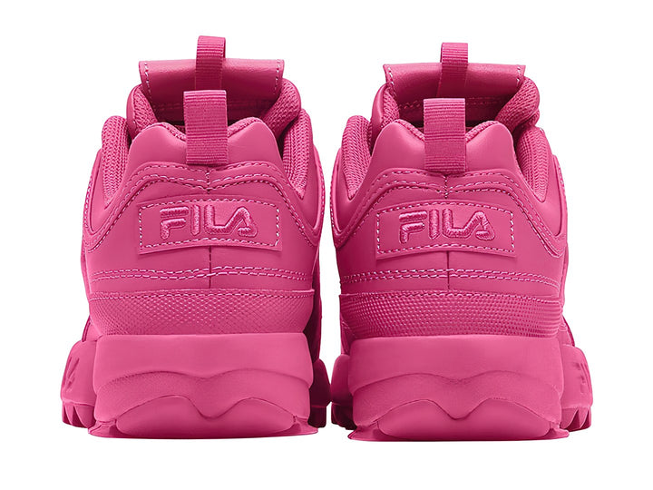Tenis FILA Disruptor II Premium en color rosa intenso con suela robusta y dentada.