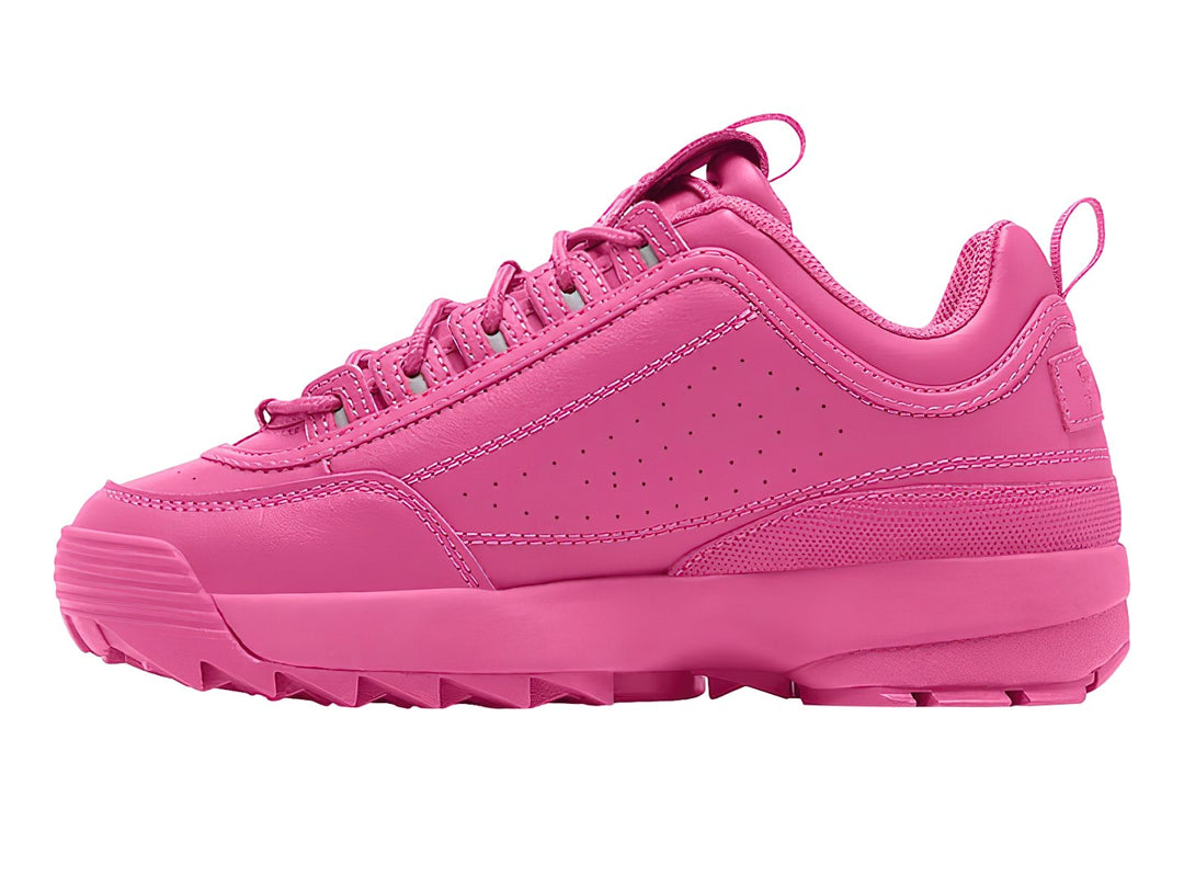 Tenis FILA Disruptor II Premium en color rosa intenso con suela robusta y dentada.