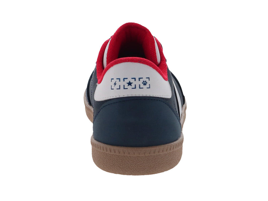 Tenis para Niño color azul marino con franja blanca lateral y suela color café.