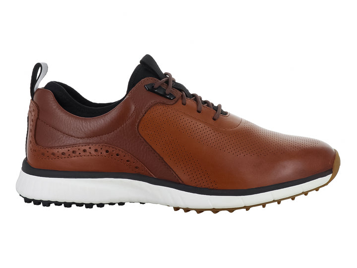 Zapato híbrido Johnston &amp; Murphy color tan con suela blanca y detalles perforados.