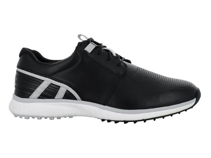 Zapato híbrido negro de cuero con suela blanca y detalles grises.