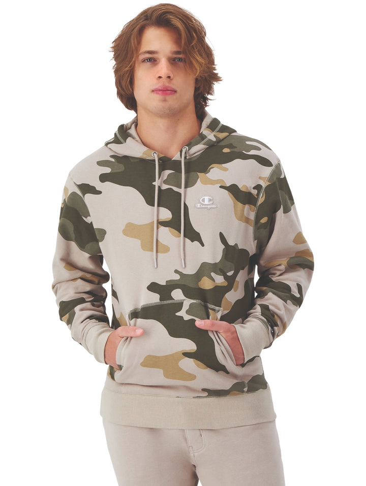 Sudadera con capucha Champion con estampado de camuflaje en tonos beige y verde oliva.