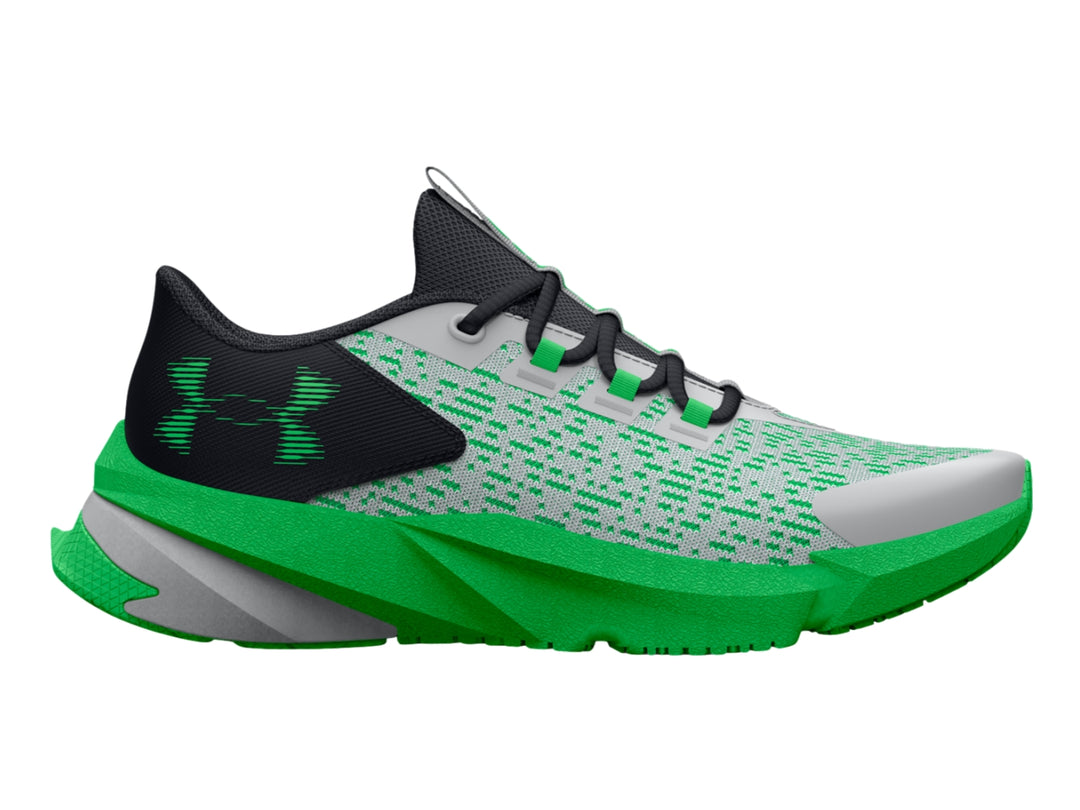 Tenis deportivos Under Armour para niños en colores gris, negro y verde brillante con suela robusta.