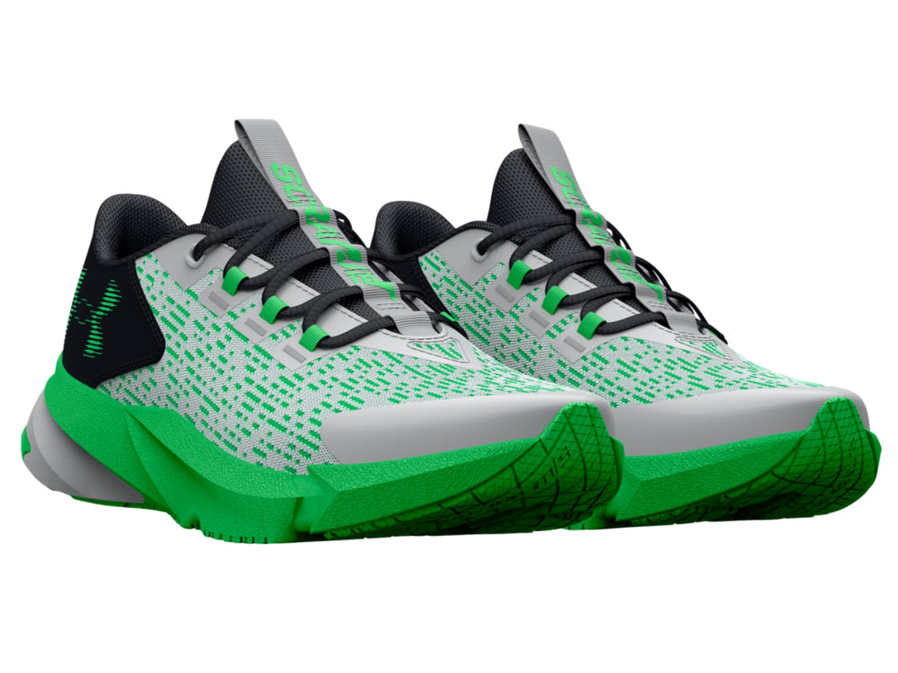 Tenis deportivos Under Armour para niños en colores gris, negro y verde brillante con suela robusta.