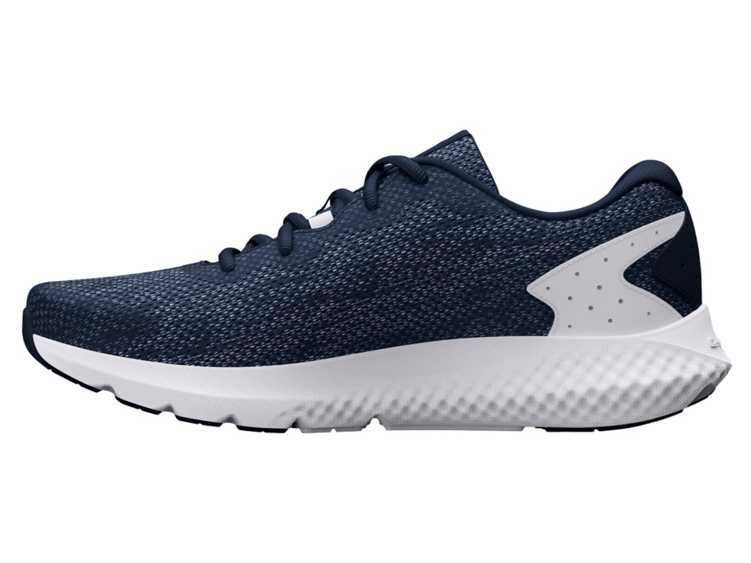 Tenis deportivos Under Armour color azul marino con suela blanca y logotipo blanco.