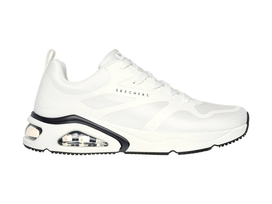 Tenis deportivos Skechers color blanco con detalles en negro y suela amortiguada con cámara de aire visible.