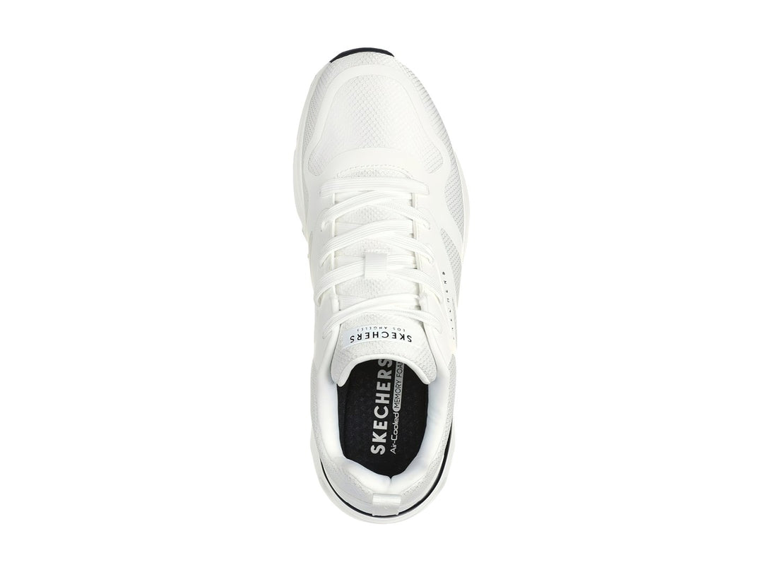 Tenis deportivos Skechers color blanco con detalles en negro y suela amortiguada con cámara de aire visible.
