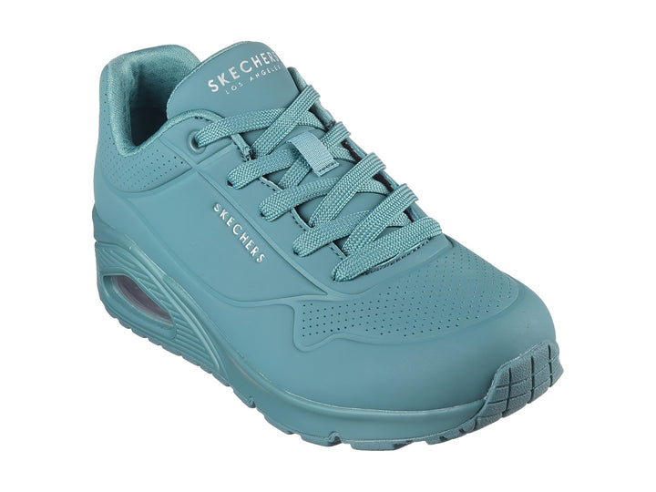 Tenis deportivos Skechers color teal con suela amortiguada y cierre de cordones.
