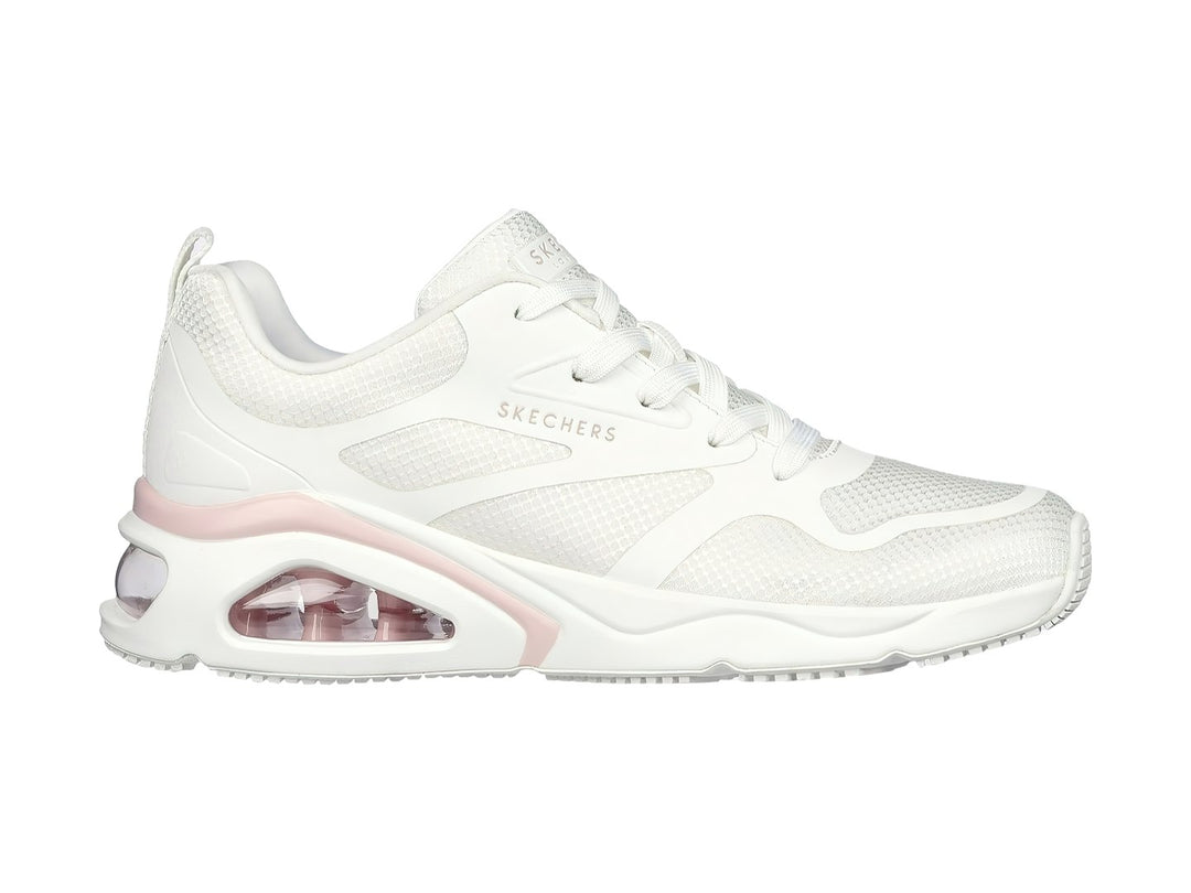 Tenis deportivos Skechers blancos con detalle rosa y cámara de aire en el talón.