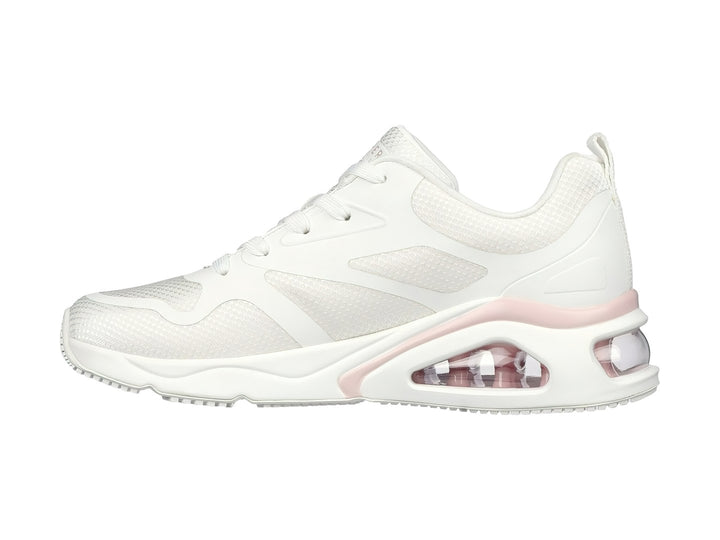 Tenis deportivos Skechers blancos con detalle rosa y cámara de aire en el talón.