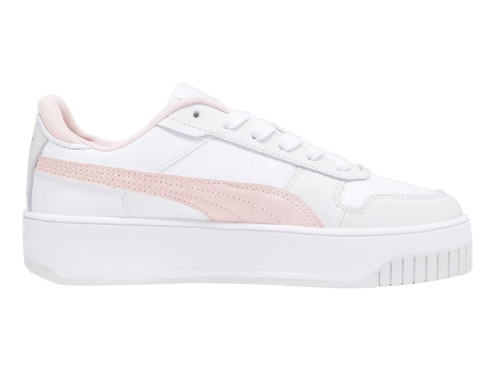 Tenis PUMA Carina Street JR en color blanco con detalles en rosa y suela de plataforma blanca.