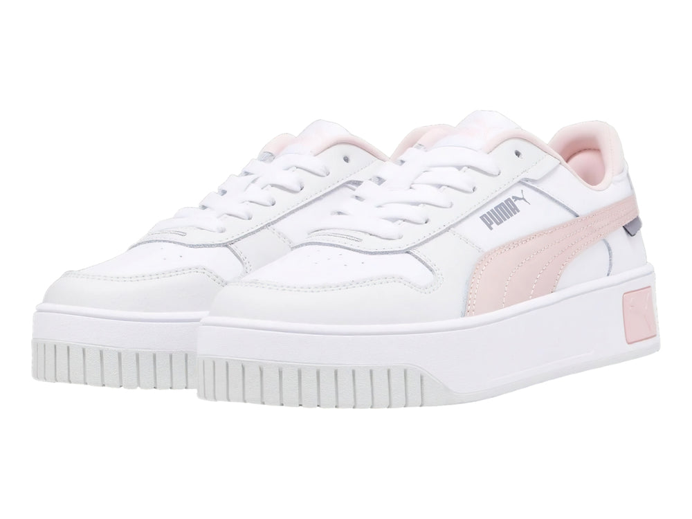 Tenis PUMA Carina Street JR en color blanco con detalles en rosa y suela de plataforma blanca.