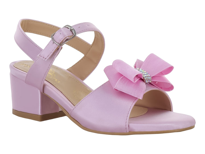 Sandalia infantil de color rosa con tacón cuadrado y un moño decorativo en la parte frontal.