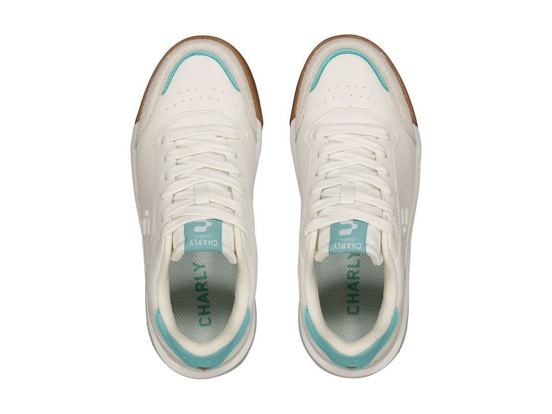 Tenis deportivos Charly color blanco con detalles en aqua y suela color café.