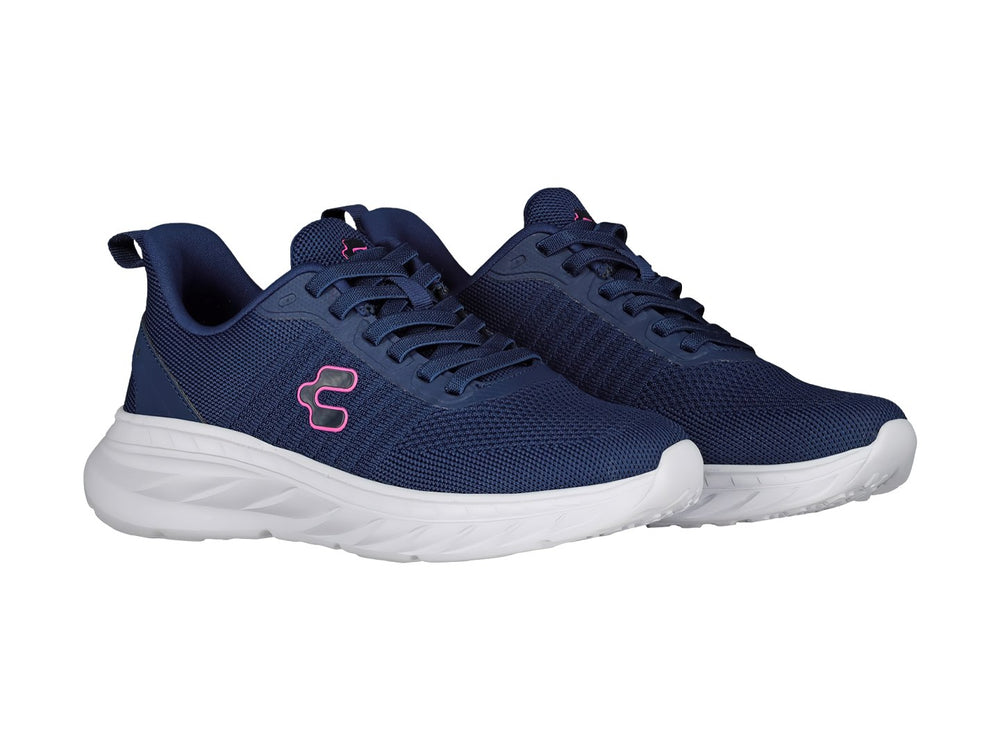 Tenis deportivos Charly en color azul marino con suela blanca y detalles en rosa.