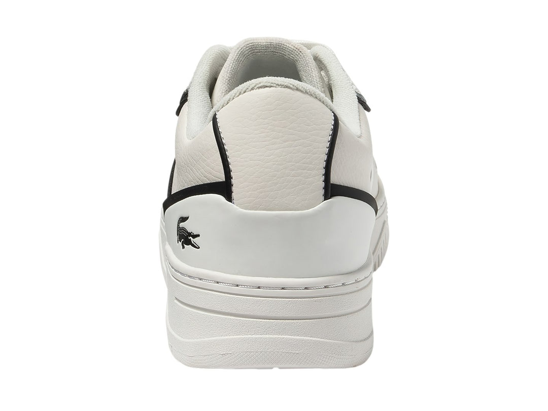 Tenis Lacoste blancos con rayas negras laterales y suela blanca.
