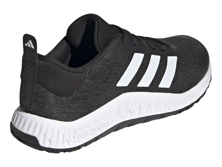 Tenis deportivos Adidas Everyset Trainer en color negro con franjas blancas y suela blanca.