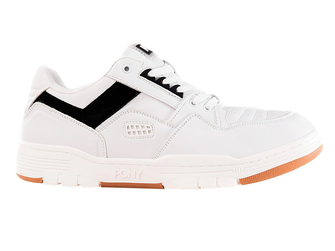 Tenis PONY blancos con franja negra lateral y suela color miel.