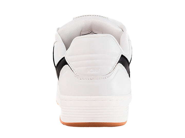 Tenis PONY blancos con franja negra lateral y suela color miel.