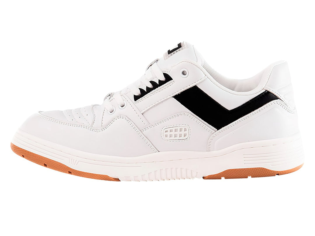 Tenis PONY blancos con franja negra lateral y suela color miel.