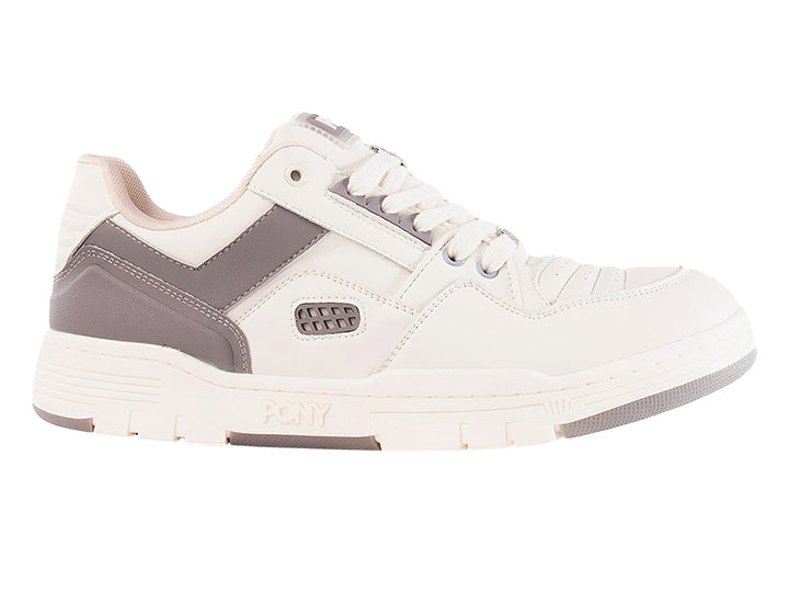 Tenis PONY blancos con detalles laterales en color gris y suela blanca.