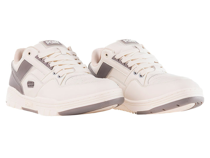 Tenis PONY blancos con detalles laterales en color gris y suela blanca.