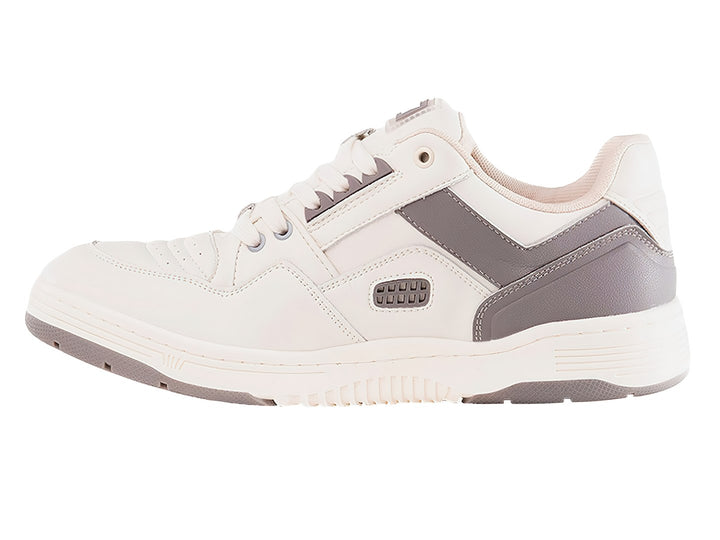 Tenis PONY blancos con detalles laterales en color gris y suela blanca.