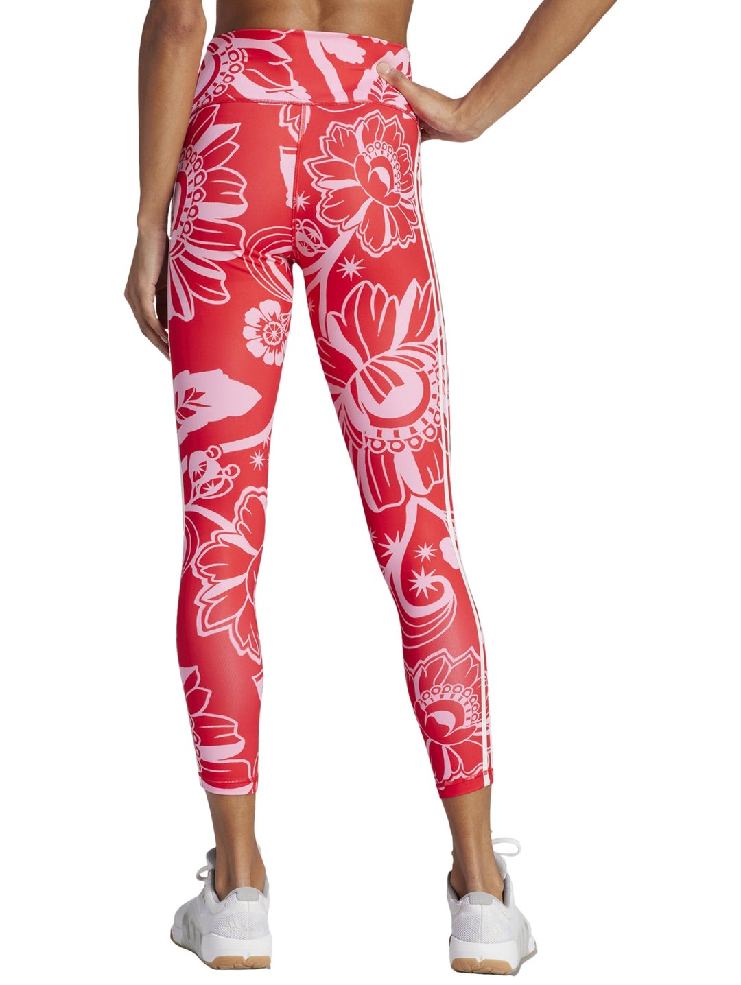 Leggings deportivos Adidas color rojo con estampado floral rosa.