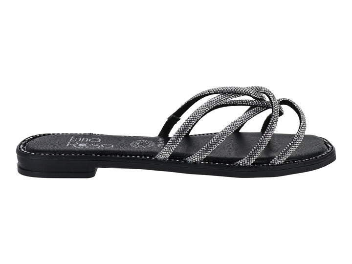 Sandalia plana color negro con tiras brillantes plateadas entrelazadas para mujer.
