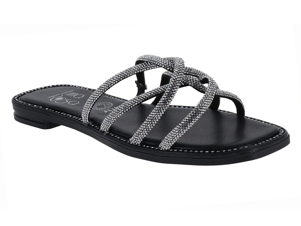 Sandalia plana color negro con tiras brillantes plateadas entrelazadas para mujer.