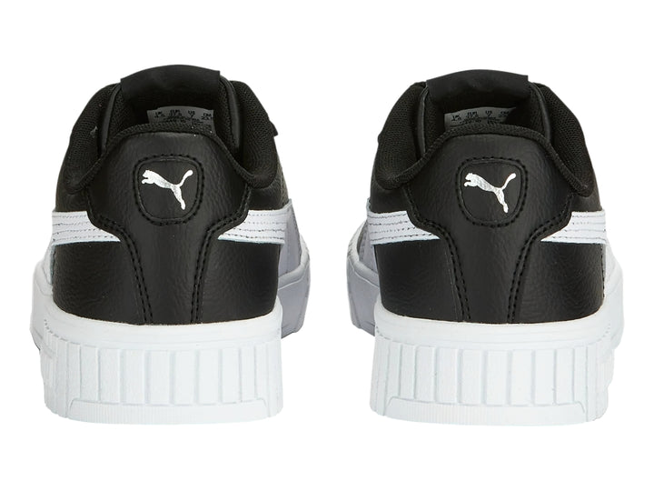 Tenis PUMA Carina 2.0 color negro con suela blanca y franja lateral blanca.