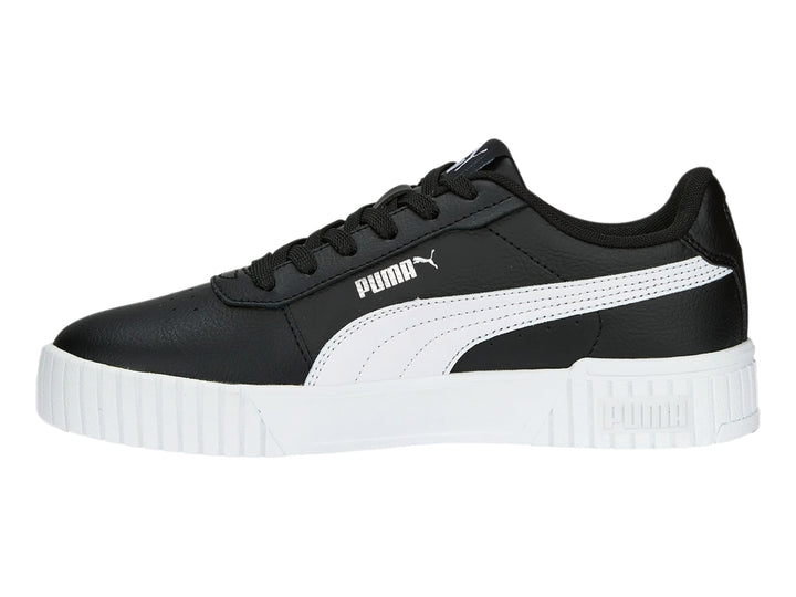 Tenis PUMA Carina 2.0 color negro con suela blanca y franja lateral blanca.