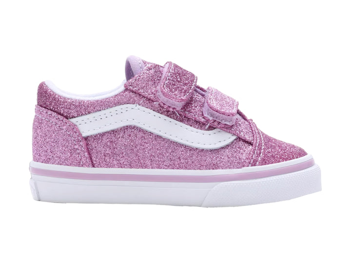 Tenis VANS Old Skool color morado brillante con suela blanca y cierres de velcro.