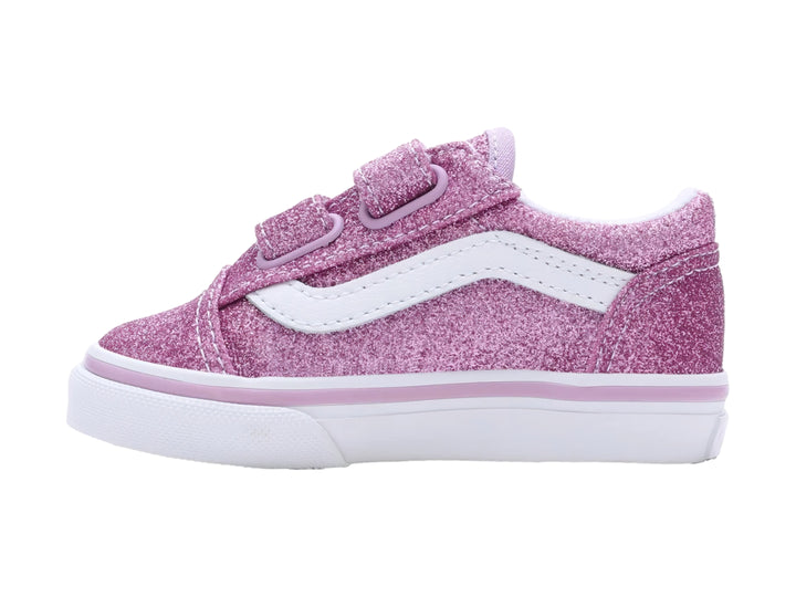 Tenis VANS Old Skool color morado brillante con suela blanca y cierres de velcro.