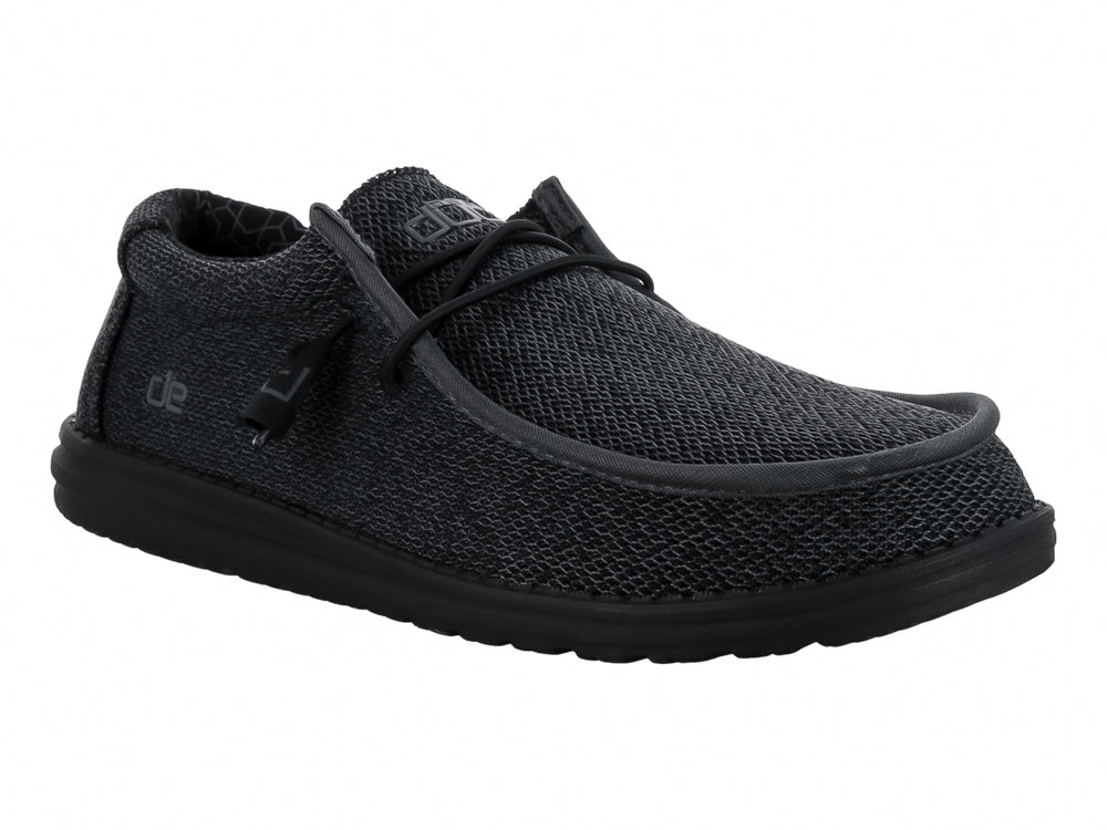 Zapato casual Hey Dude Wally Sox en color negro total con acabado tejido y suela negra.