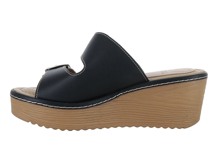 Sandalia negra de plataforma con dos correas ajustables mediante hebillas plateadas y suela color madera.