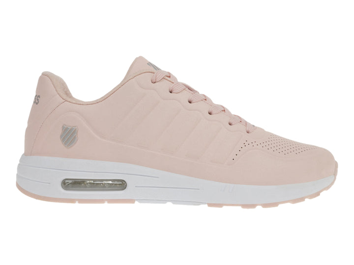 Tenis K-Swiss color rosa con suela blanca y cámara de aire visible en el talón.