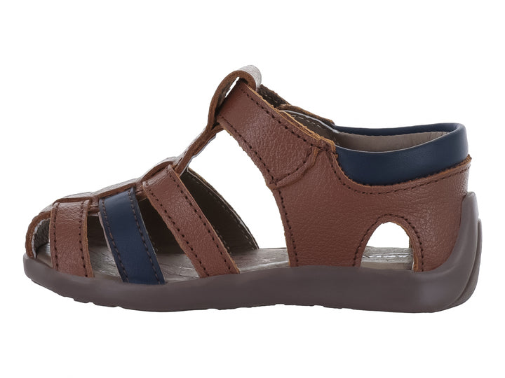 Sandalia para niño marca PIECO en colores cognac e indigo con cierre de velcro y suela flexible.