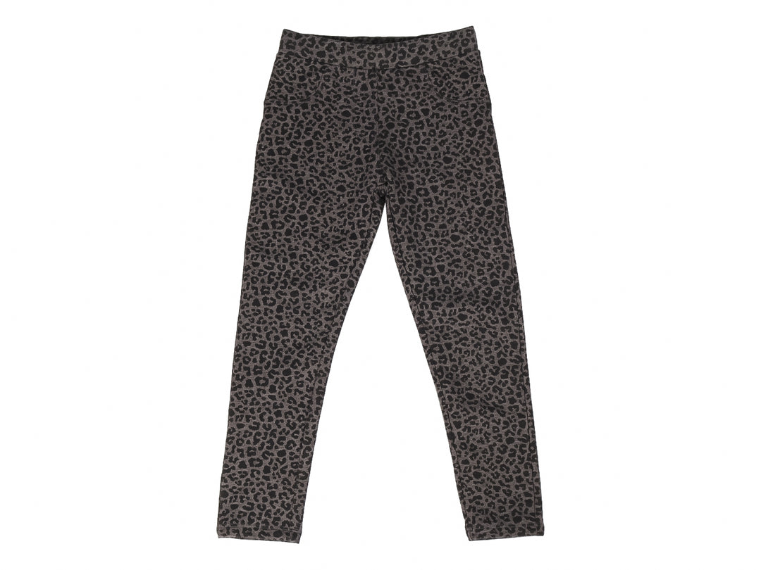 Pantalón ajustado para niña en color gris oscuro con estampado de leopardo.