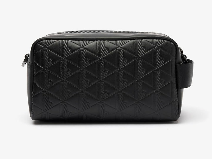 Bolso bandolera Lacoste color negro con textura grabada, correa ajustable y cierre frontal.