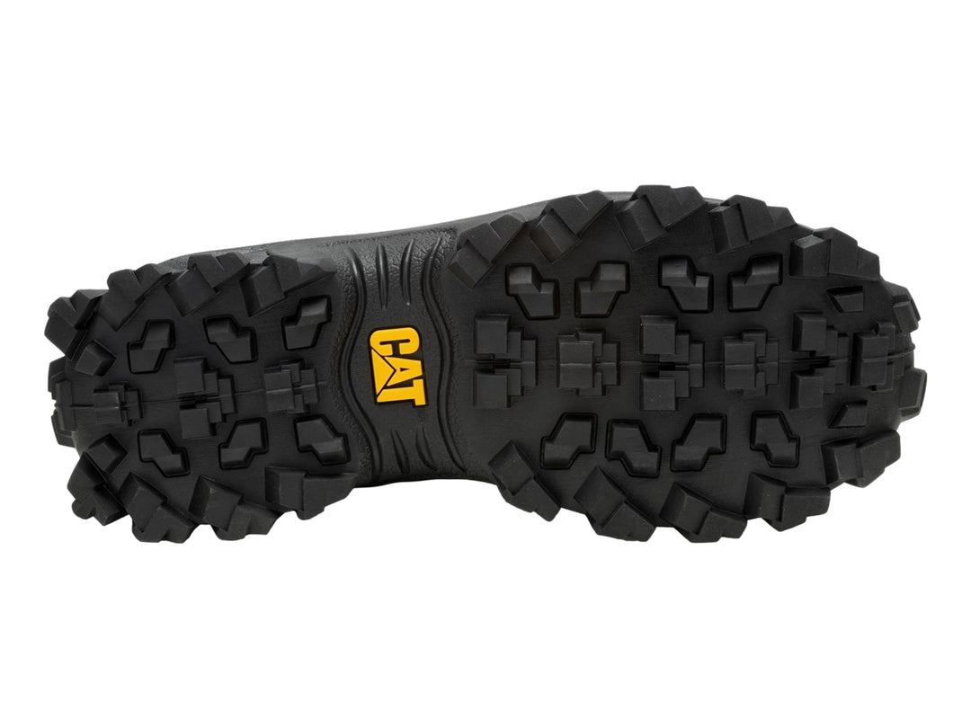 Tenis Caterpillar color negro y beige con detalles de corcho y suela robusta.