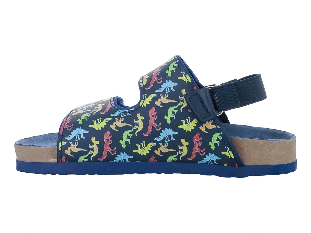 Sandalia infantil color azul marino con estampado de dinosaurios multicolores y cierre de velcro.
