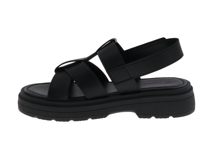 Sandalia Tropicana de color negro con plataforma y tiras cruzadas sobre fondo blanco.