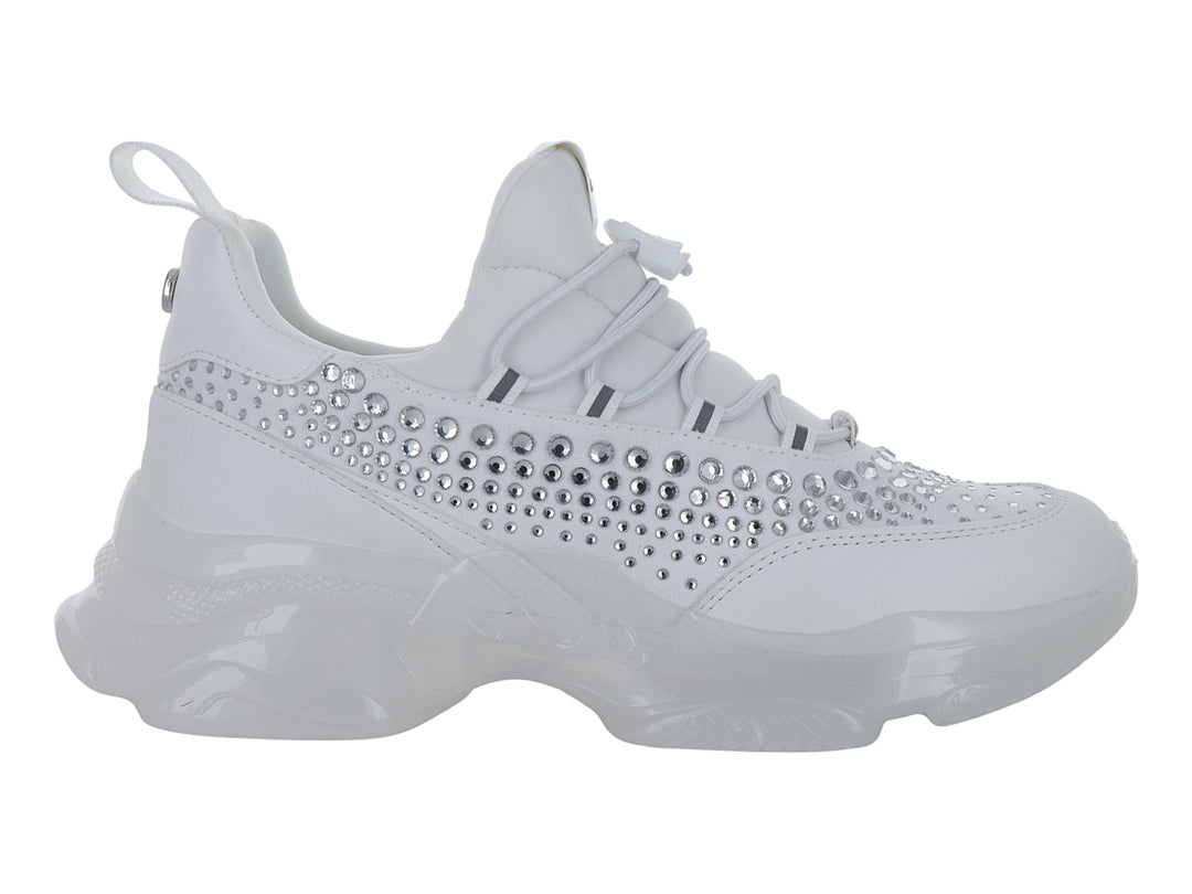 Tenis blancos de plataforma Steve Madden con incrustaciones de cristales brillantes en el lateral.