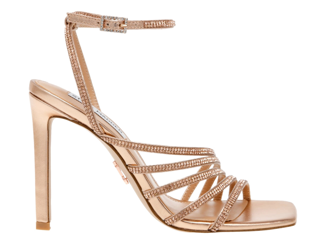 Sandalia de tacón alto color oro rosa con tiras brillantes y punta cuadrada.