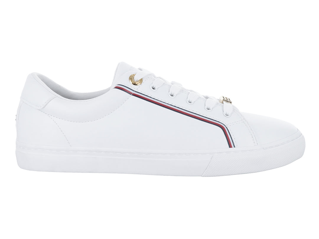 Tenis blancos de Tommy Hilfiger con franja multicolor lateral y detalles dorados.