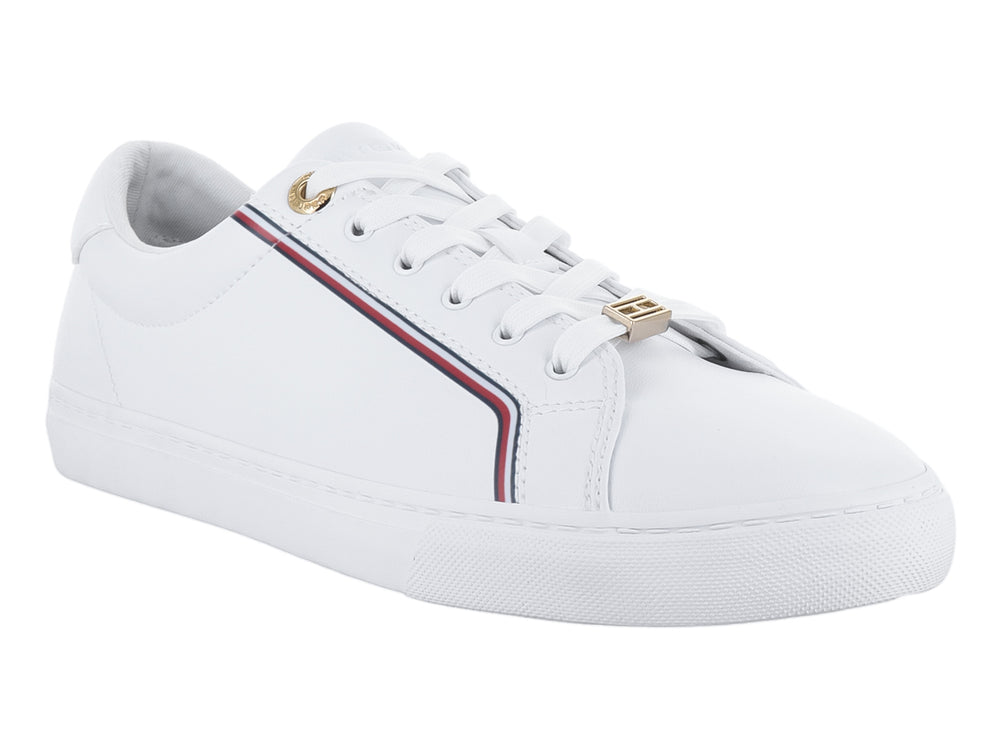 Tenis blancos de Tommy Hilfiger con franja multicolor lateral y detalles dorados.