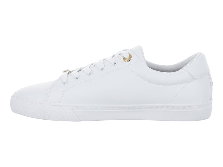 Tenis blancos de Tommy Hilfiger con franja multicolor lateral y detalles dorados.