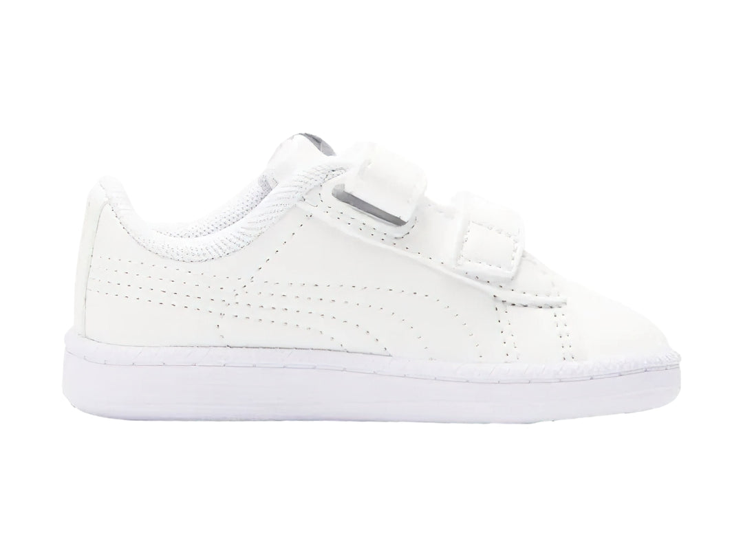 Tenis blancos PUMA para bebé con cierres de velcro y suela blanca.